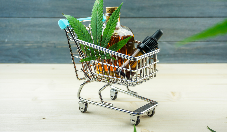 cbd products with marijuana leaf in trolley